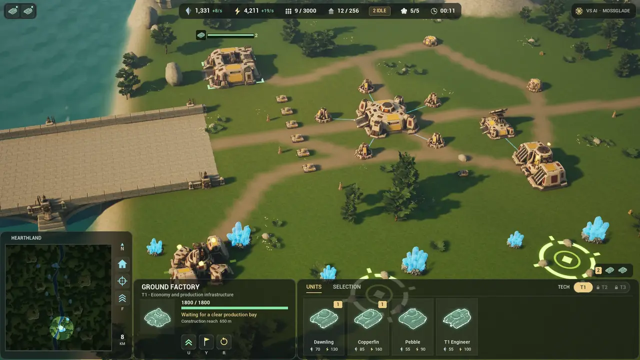 In game: an early Sunhearth base by a stone bridge over the river, with the ground factory selected and its build menu of four tanks open